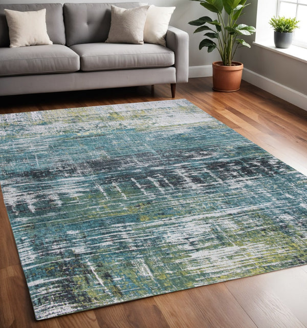 HomeRoots 5' Blue and Green Abstract Area Rug with Non-Skid Backing for Safe and Stylish Home Décor 5' X 7' 548620