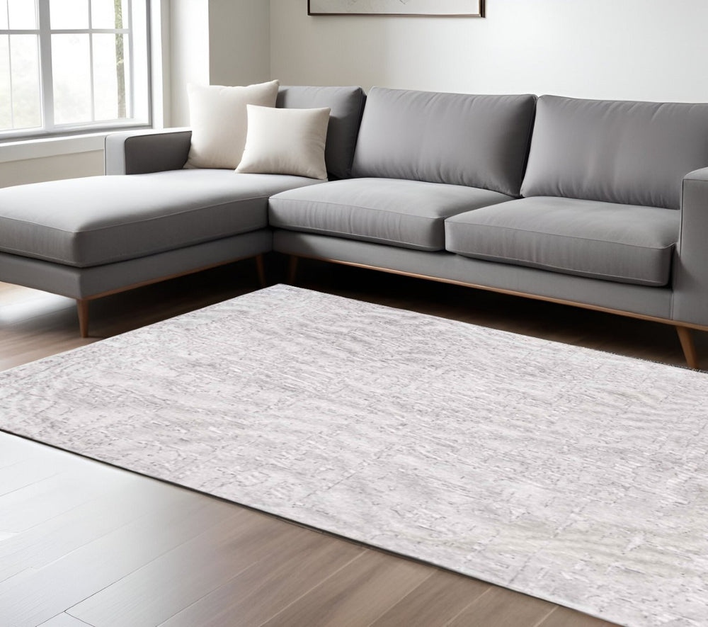 HomeRoots 3'' White Abstract Non-Skid Area Rug - Modern Design for Entryways, Durable Machine-Woven Style 7' X 9' 548668