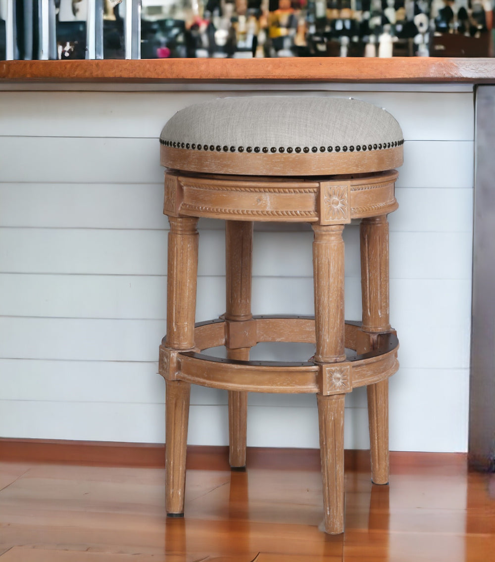 Homeroots 31" Beige And Natural Solid Wood Swivel Backless Bar Height Bar Chair   550093