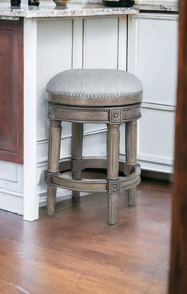 HomeRoots 26" Gray Solid Wood Swivel Backless Counter Stool - Chic, Durable Design for Modern Home Bars & Kitchens 550094