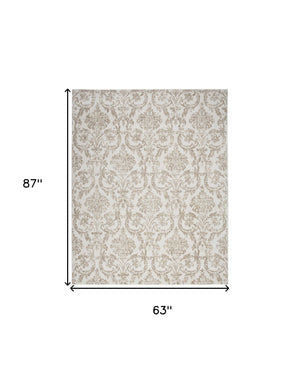 Homeroots 5' X 7' Beige And Ivory Damask Distressed Non Skid Area Rug  Polypropylene 550121