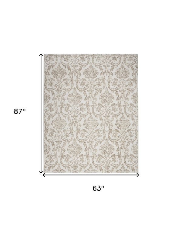 Homeroots 5' X 7' Beige And Ivory Damask Distressed Non Skid Area Rug  Polypropylene 550121