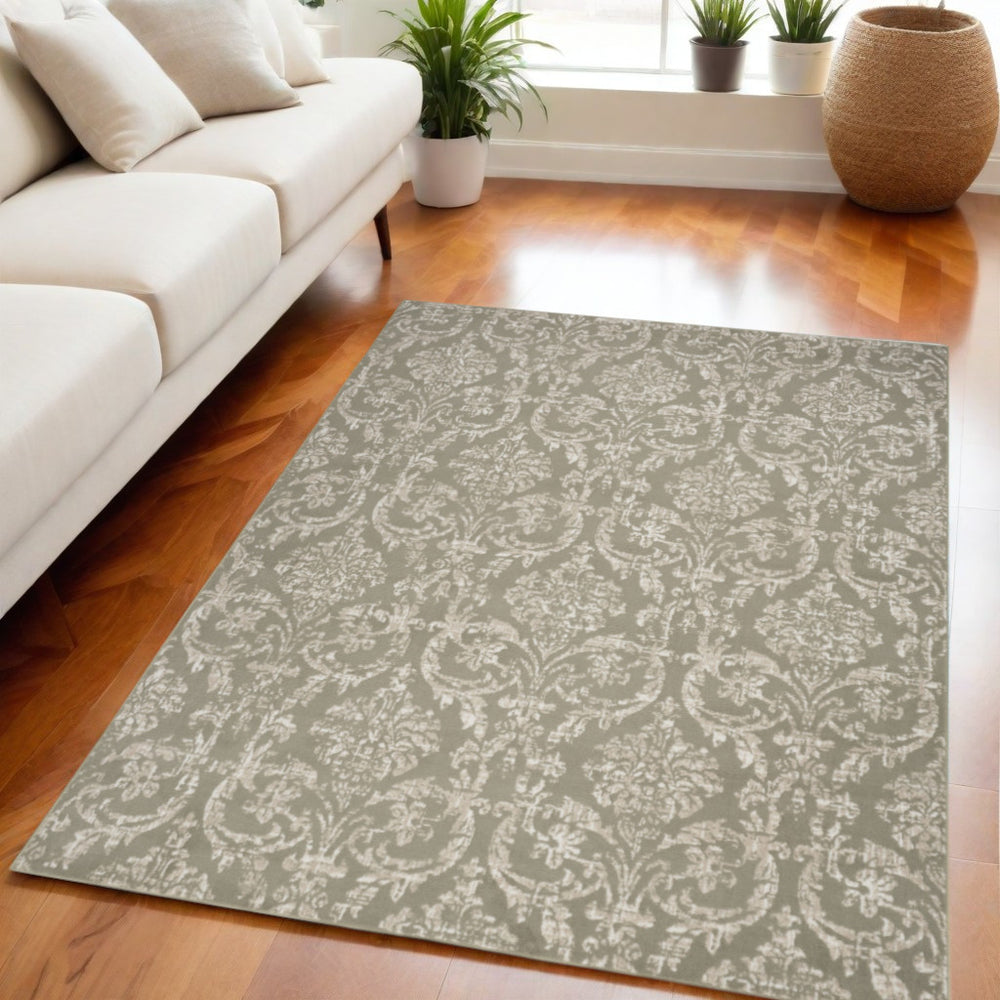 Homeroots 5' X 7' Olive Green And Ivory Damask Distressed Non Skid Area Rug  Polypropylene 550137