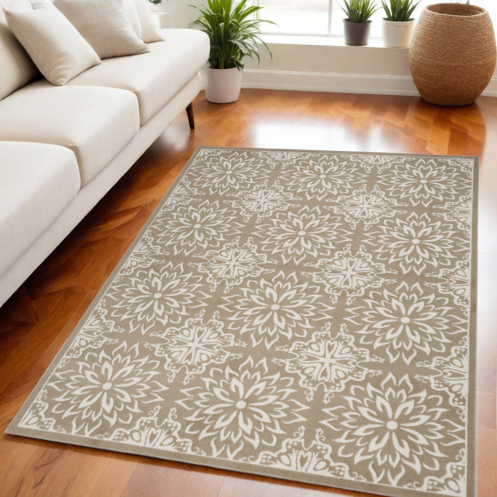Homeroots 5' X 7' Taupe And Ivory Floral Medallion Non Skid Area Rug  Polypropylene 550142