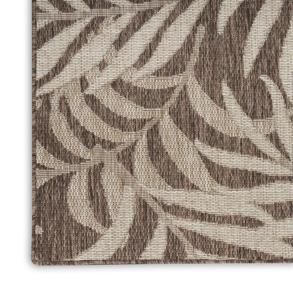 HomeRoots 6' X 9' Brown and Ivory Palm Leaf Area Rug – Durable Indoor/Outdoor Tropical Accent for Any Space 550159