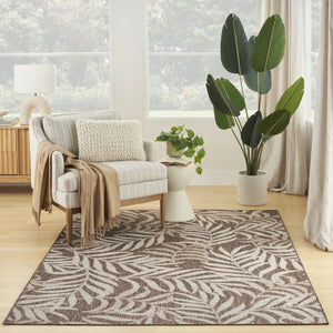 HomeRoots 6' X 9' Brown and Ivory Palm Leaf Area Rug – Durable Indoor/Outdoor Tropical Accent for Any Space 550159