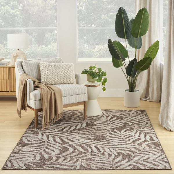 HomeRoots 6' X 9' Brown and Ivory Palm Leaf Area Rug – Durable Indoor/Outdoor Tropical Accent for Any Space 550159