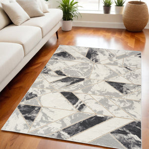 Homeroots 5' X 7' Ivory Black And Gray Abstract Non Skid Area Rug  Polypropylene,Polyester 550170