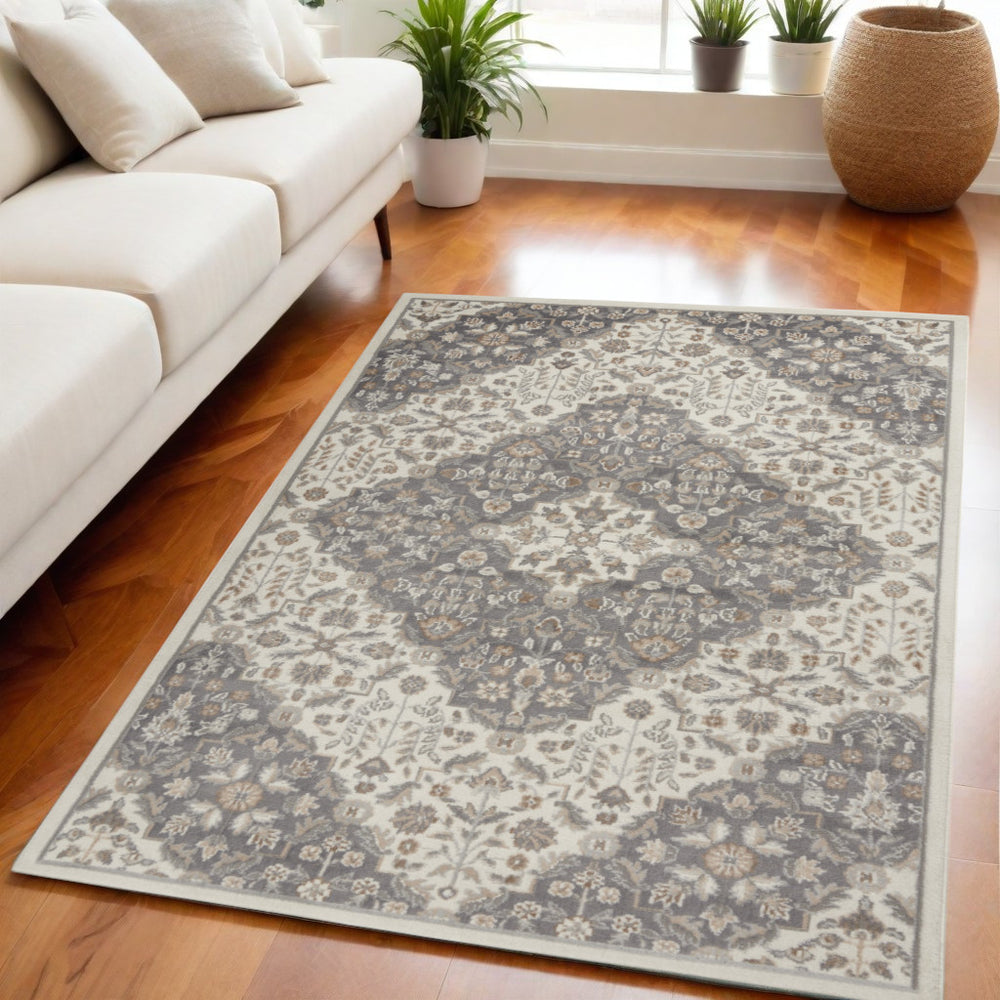 Homeroots 5' X 7' Ivory And Gray Floral Non Skid Area Rug  Polypropylene,Polyester 550175