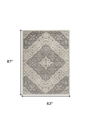Homeroots 5' X 7' Ivory And Gray Floral Non Skid Area Rug  Polypropylene,Polyester 550175