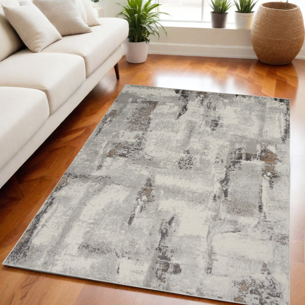 Homeroots 5' X 7' Ivory Gray And Brown Abstract Non Skid Area Rug  Polypropylene,Polyester 550181