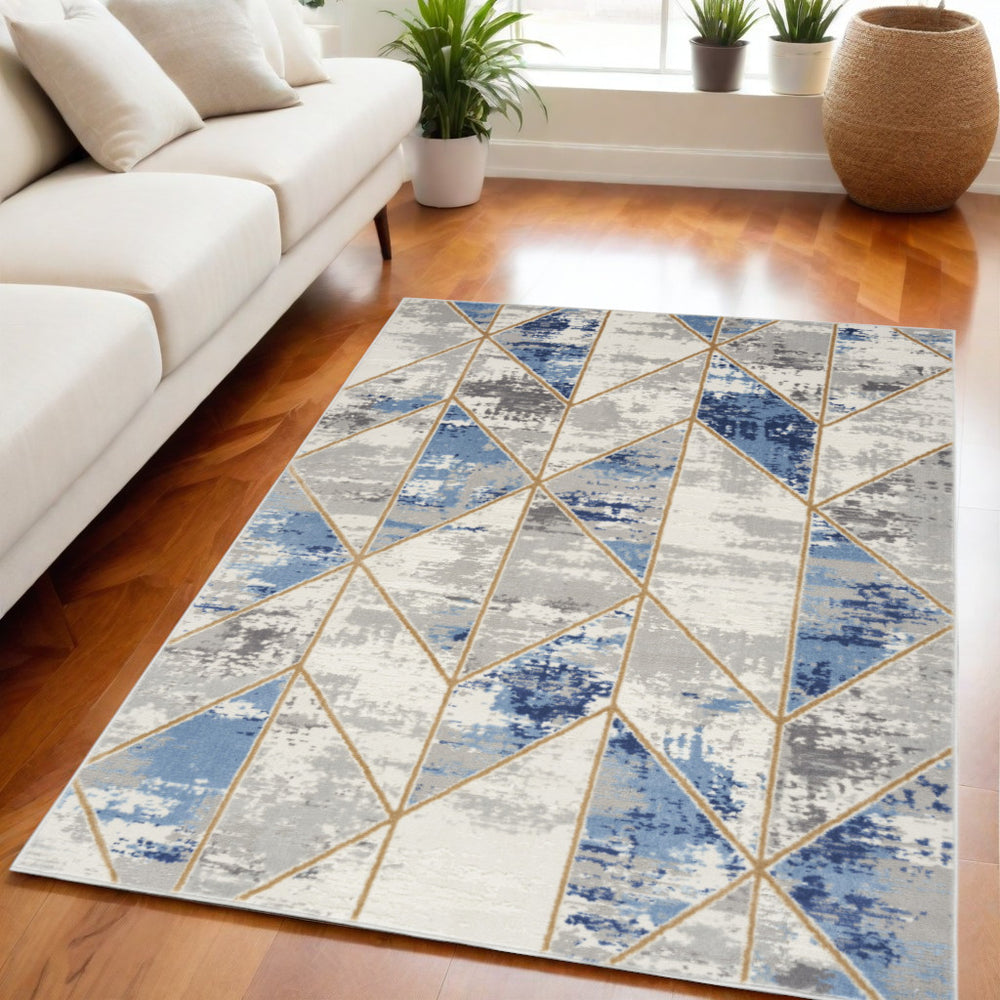Homeroots 5' X 7' Ivory Blue And Gray Abstract Non Skid Area Rug  Polypropylene,Polyester 550182