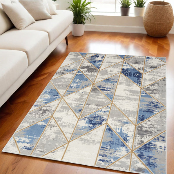 Homeroots 5' X 7' Ivory Blue And Gray Abstract Non Skid Area Rug  Polypropylene,Polyester 550182