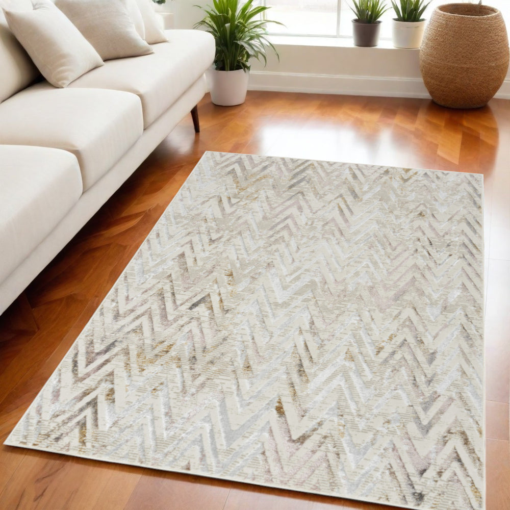 Homeroots 5' X 7' Beige Blue And Ivory Chevron Distressed Non Skid Area Rug  Polyester 550215