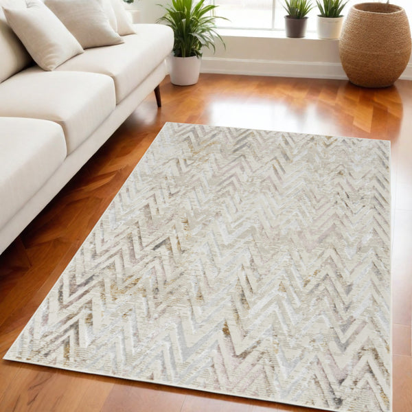 Homeroots 5' X 7' Beige Blue And Ivory Chevron Distressed Non Skid Area Rug  Polyester 550215