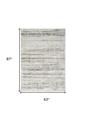 Homeroots 5' X 7' Cream And Gray Abstract Non Skid Area Rug  Polyester 550220