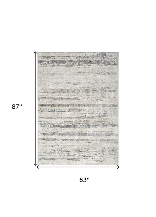 Homeroots 5' X 7' Cream And Gray Abstract Non Skid Area Rug  Polyester 550220
