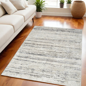 Homeroots 5' X 7' Cream And Gray Abstract Non Skid Area Rug  Polyester 550220