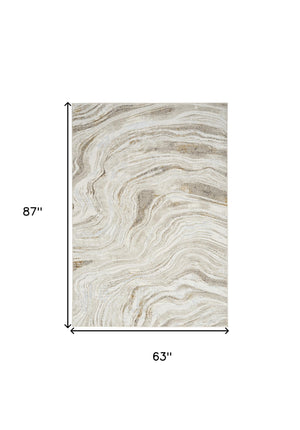 Homeroots 5' X 7' Gold Gray And Ivory Abstract Non Skid Area Rug  Polyester 550230