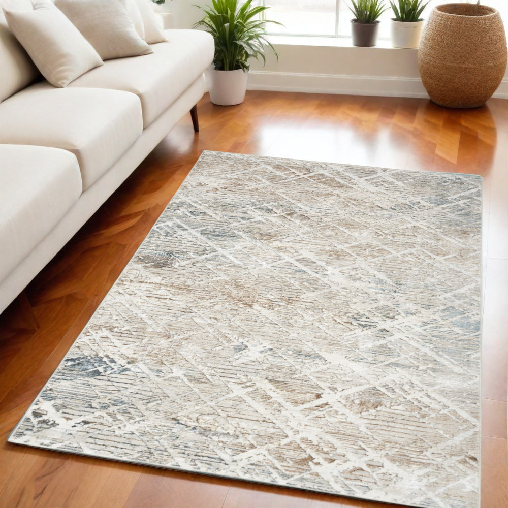 Homeroots 5' X 7' Ivory Blue And Gray Abstract Non Skid Area Rug  Polyester 550231