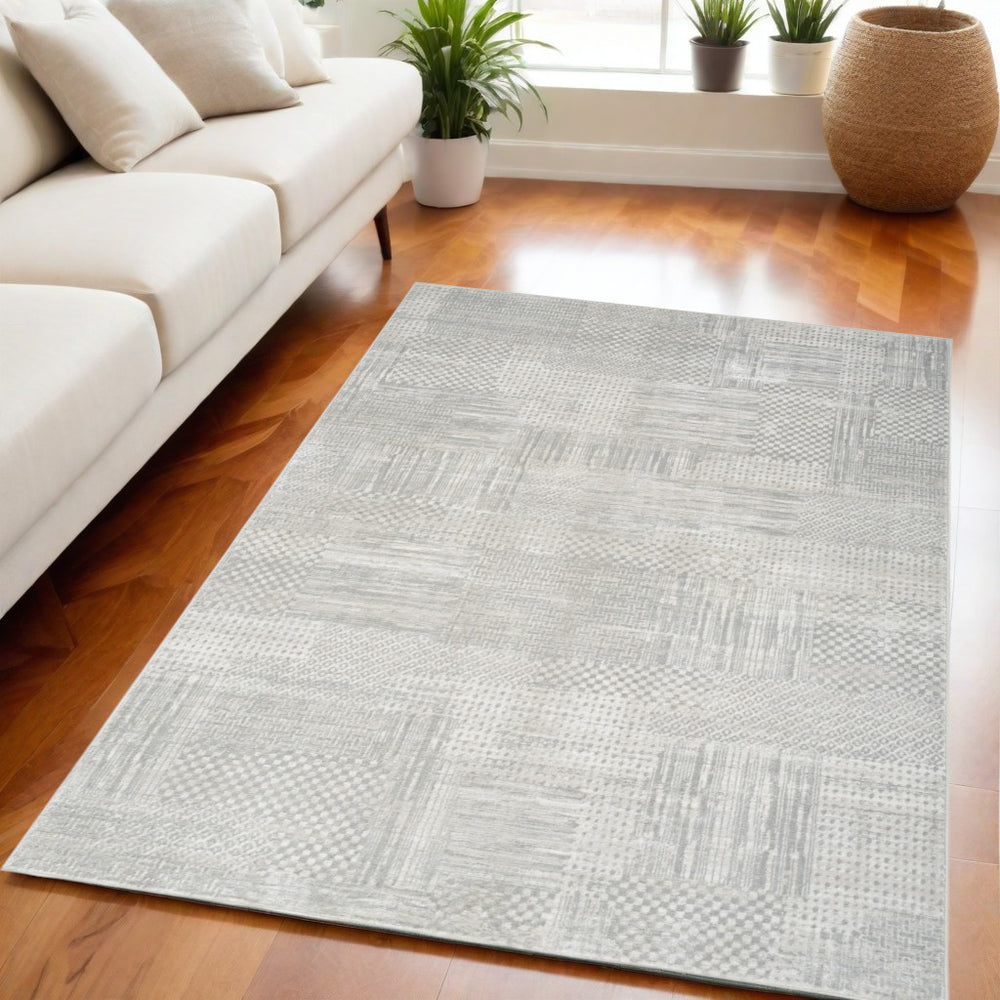 Homeroots 5' X 7' Silver And Gray Abstract Non Skid Area Rug  Polyester 550232