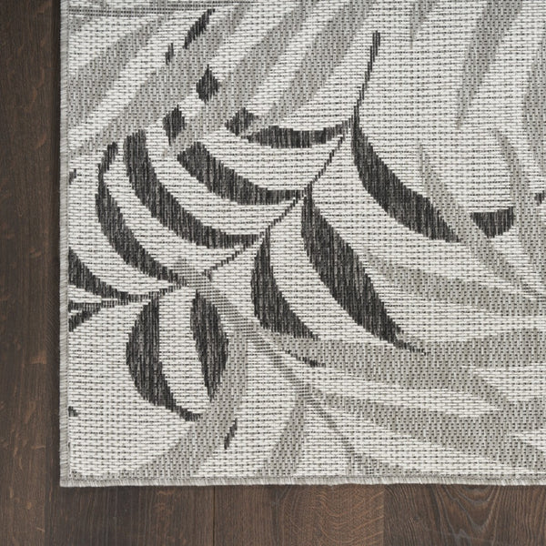 HomeRoots 8' X 10' Gray Black Ivory Palm Leaf Rug - Stylish Indoor/Outdoor Area Rug for Tropical Elegance! 550235