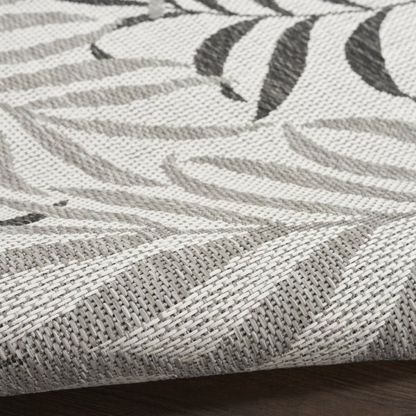HomeRoots 8' X 10' Gray Black Ivory Palm Leaf Rug - Stylish Indoor/Outdoor Area Rug for Tropical Elegance! 550235
