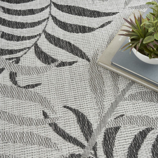 HomeRoots 8' X 10' Gray Black Ivory Palm Leaf Rug - Stylish Indoor/Outdoor Area Rug for Tropical Elegance! 550235