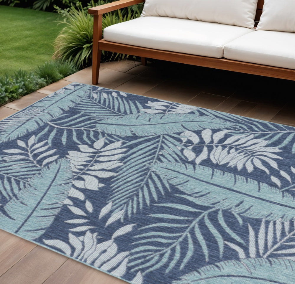HomeRoots 8' x 10' Navy Blue Tropical Palm Leaf Rug – Indoor/Outdoor Durable Coastal Charm for Any Space 550243