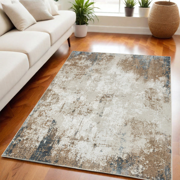 Homeroots 5' X 7' Ivory Black And Taupe Abstract Distressed Non Skid Area Rug  Polyester 550246