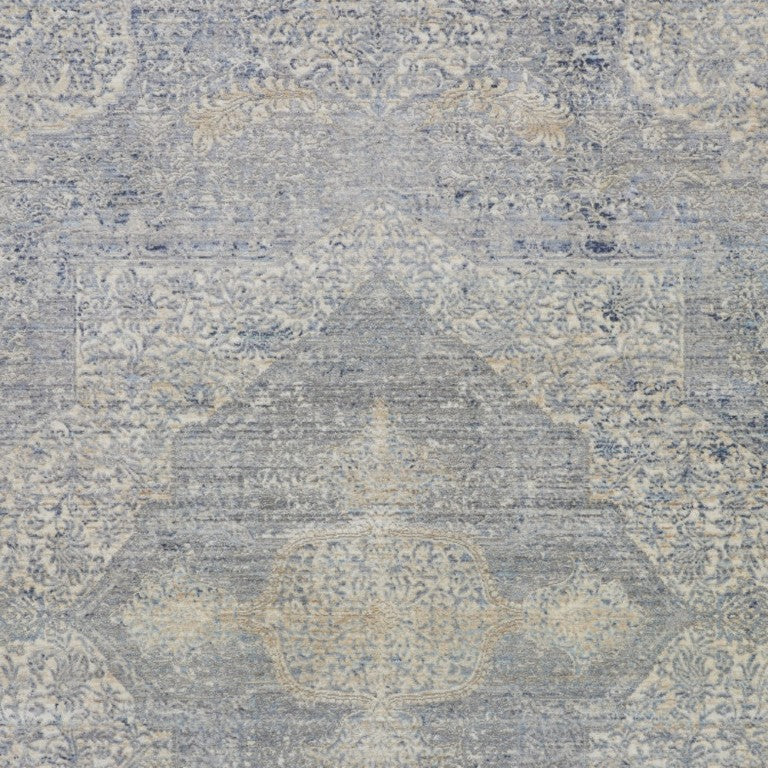 HomeRoots 5 X 8 Floral Area Rug in Blue Gray and Cream with Fringe and Non Slip Backing 550260