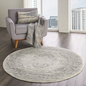 HomeRoots 8' Floral Medallion Distressed Rug in Ivory and Gray – Timeless Elegance for Any Home Decor 8' Round 550271