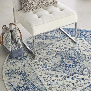 HomeRoots 8' Ivory and Light Blue Floral Medallion Rug - Timeless Distressed Design for Elegant Home Decor 8' Round 550272