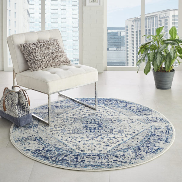 Homeroots 8' Ivory And Light Blue Floral Medallion Distressed Round Rug - Durable, Stain Resistant, Stylish Decor  Polypropylene 550272