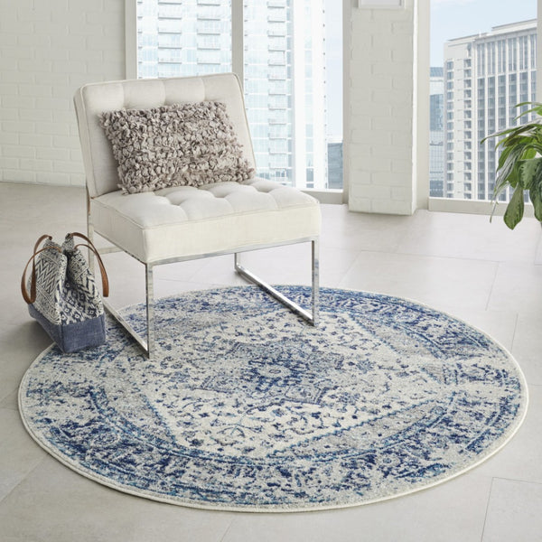 HomeRoots 8' Ivory and Light Blue Floral Medallion Rug - Timeless Distressed Design for Elegant Home Decor 8' Round 550272