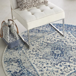 Homeroots 8' Ivory And Light Blue Floral Medallion Distressed Round Rug - Durable, Stain Resistant, Stylish Decor  Polypropylene 550272