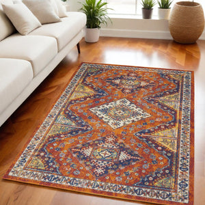 Homeroots 5' X 7' Ivory Blue And Orange Geometric Power Loom Area Rug  Polypropylene 550296