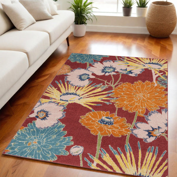 Homeroots 5' X 7' Orange And Red Floral Power Loom Area Rug  Polypropylene 550298