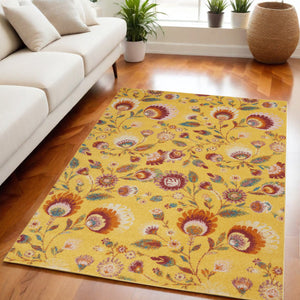 Homeroots 5' X 7' Yellow Floral Power Loom Area Rug  Polypropylene 550302