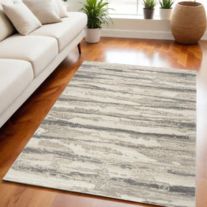 Homeroots 5' X 7' Ivory Beige And Gray Abstract Non Skid Area Rug  Polyester 550312