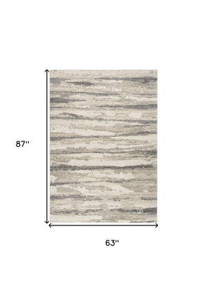 Homeroots 5' X 7' Ivory Beige And Gray Abstract Non Skid Area Rug  Polyester 550312