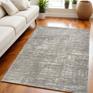 Homeroots 5' X 7' Ivory And Gray Abstract Non Skid Area Rug  Polyester 550313