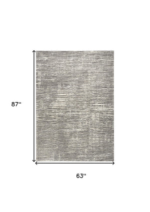 Homeroots 5' X 7' Ivory And Gray Abstract Non Skid Area Rug  Polyester 550313