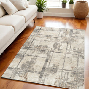 Homeroots 5' X 7' Ivory Gray And Black Abstract Non Skid Area Rug  Polyester 550315