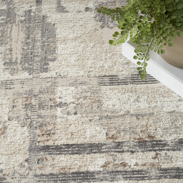 HomeRoots 5' Modern Abstract Area Rug in Ivory, Gray & Black - Durable, Stain-Resistant, Non-Skid Design 5' X 7' 550315