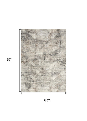 Homeroots 5' X 7' Ivory And Gray Abstract Non Skid Area Rug  Polyester 550316