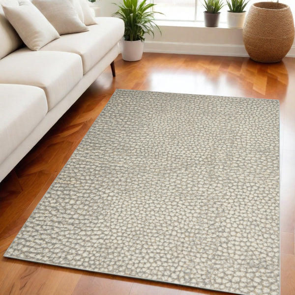 Homeroots 5' X 7' Beige And Gray Animal Print Power Loom Area Rug  Polypropylene,Polyester 550331