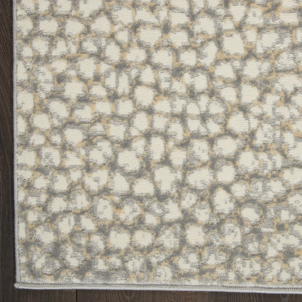 Homeroots 5' X 7' Beige And Gray Animal Print Power Loom Area Rug  Polypropylene,Polyester 550331