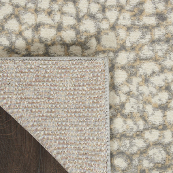 Homeroots 5' X 7' Beige And Gray Animal Print Power Loom Area Rug  Polypropylene,Polyester 550331
