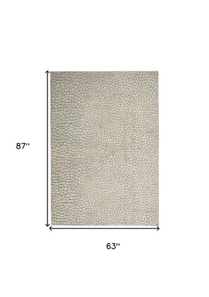 Homeroots 5' X 7' Beige And Gray Animal Print Power Loom Area Rug  Polypropylene,Polyester 550331
